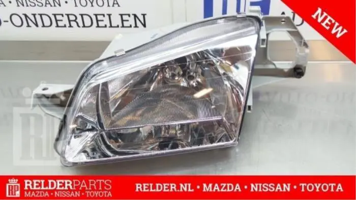Headlight, left Mazda 323F