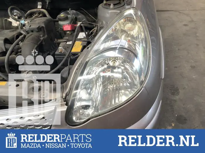 Headlight, left Toyota Yaris Verso