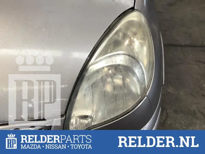 Headlight, left Toyota Yaris Verso